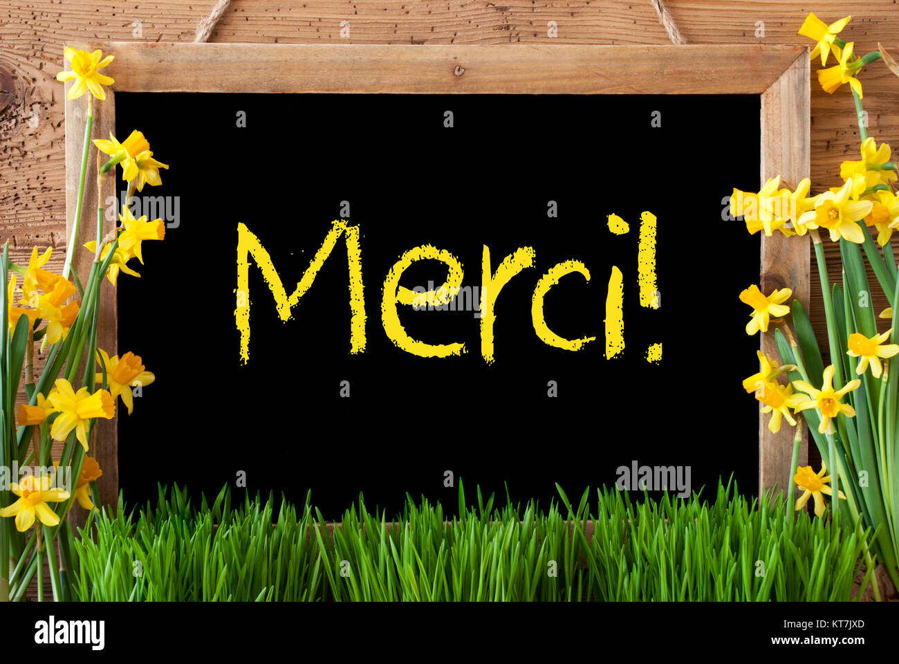 Merci Spring Blackboard With French Text Merci Means Thank You. Spring Flowers ...