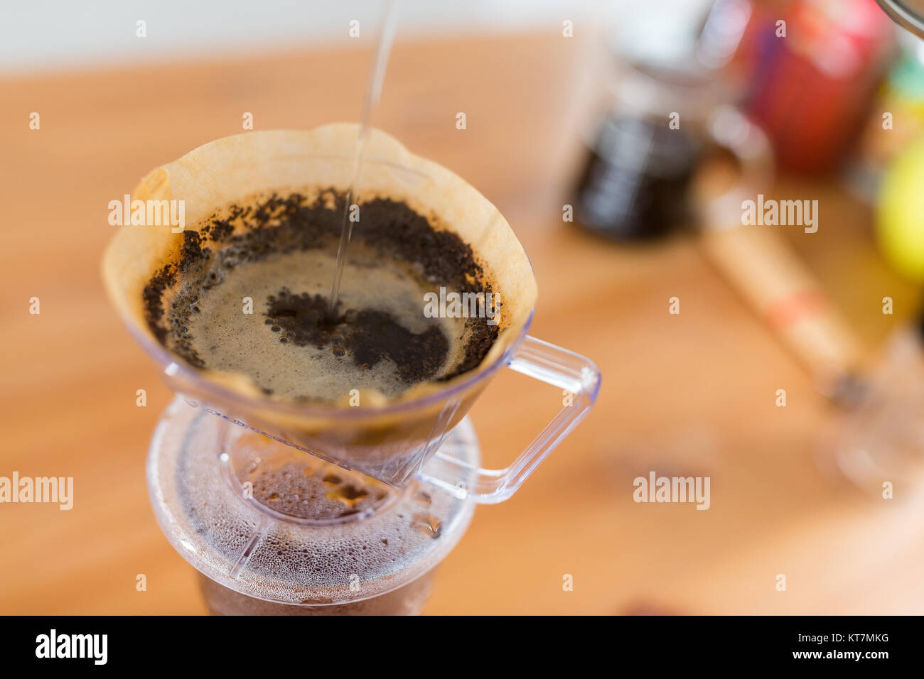 Pouring hot water into coffee drip filter Stock Photo Alamy