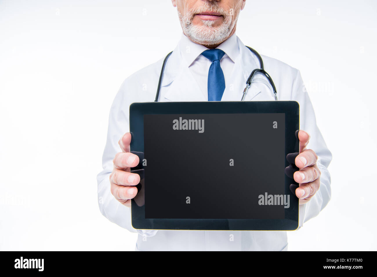 Doctor holding digital tablet Stock Photo - Alamy