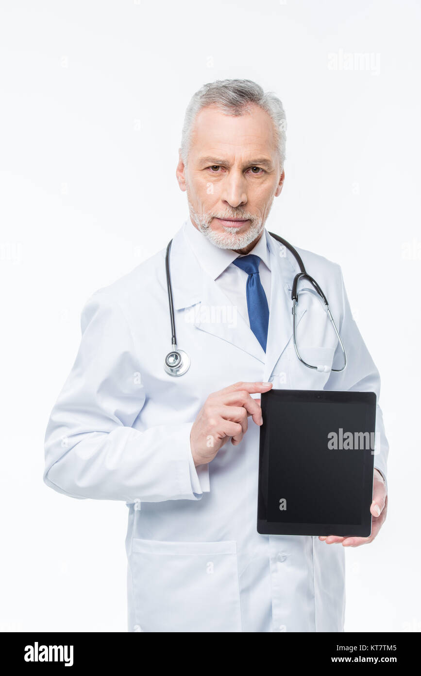 Doctor holding digital tablet Stock Photo - Alamy