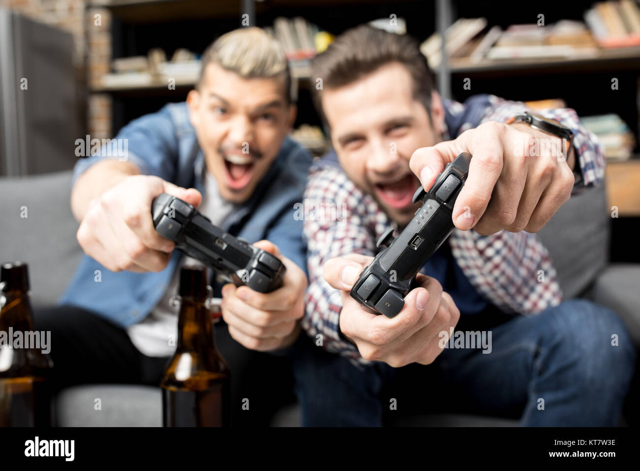 Men Playing With Joysticks Stock Photo Alamy