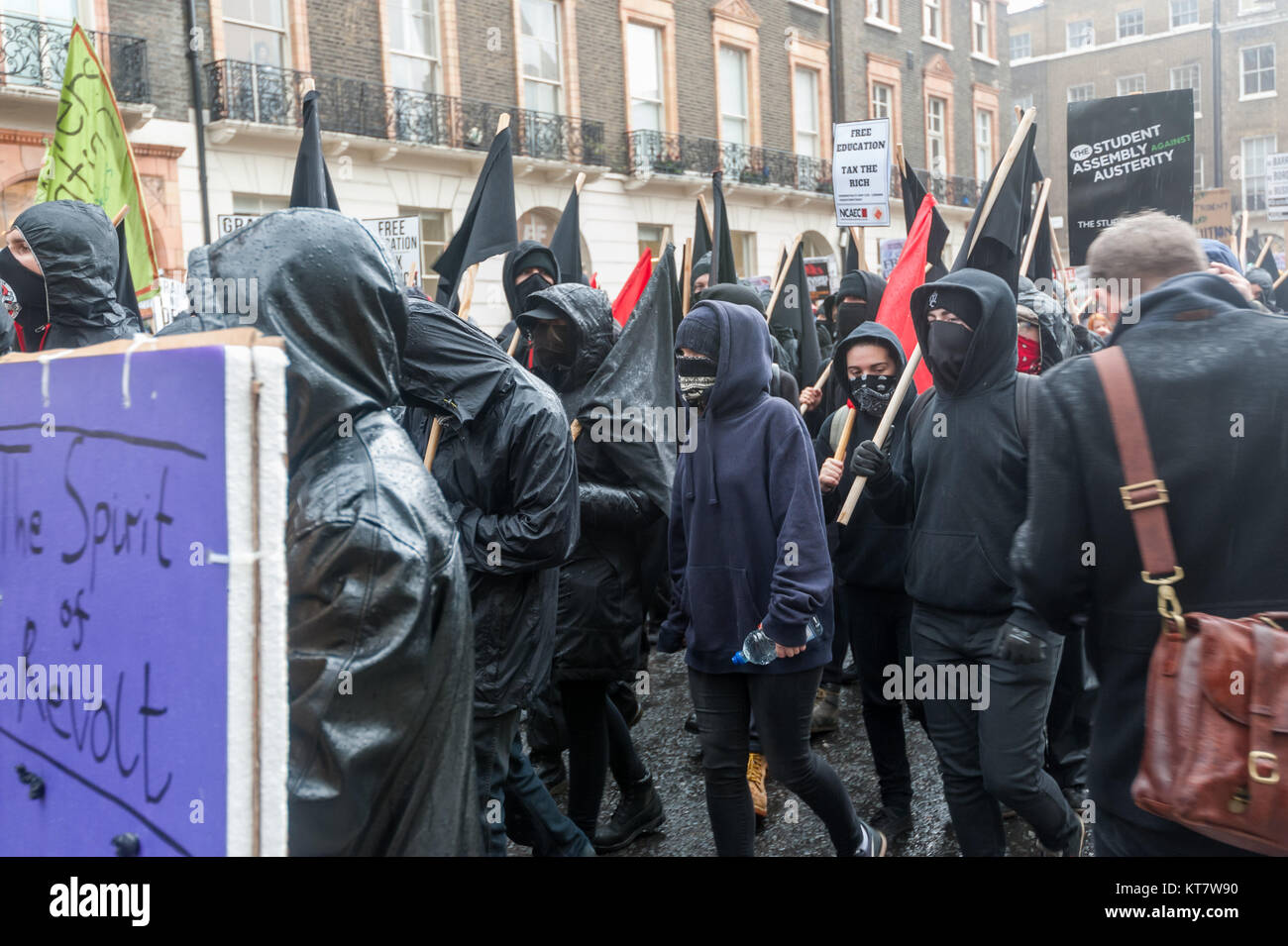 'The Sprit of Revolt' was one of the appropriate 'book' shields carried by black bloc students on the NCAFC Student march for free education - No Barriers, No Borders, No Business Stock Photo