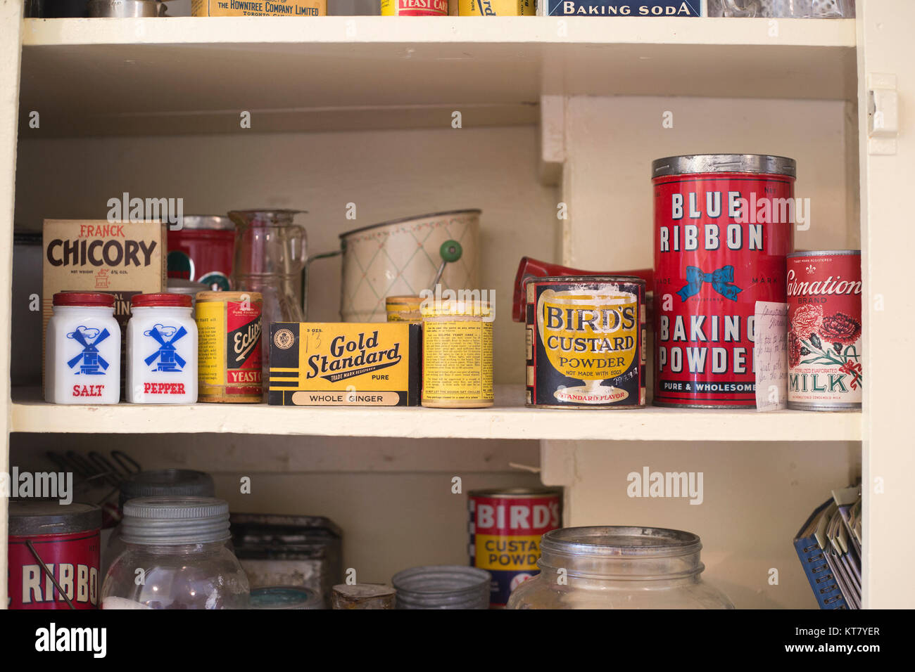 Canned and dried foods display on a shelf in cookhouse at Bar U Ranch National Historic Site, Alberta, Canada Stock Photo