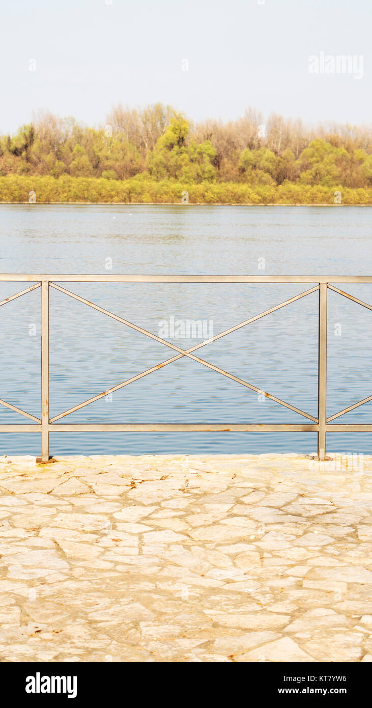 Metal railing on waterfront Stock Photo - Alamy