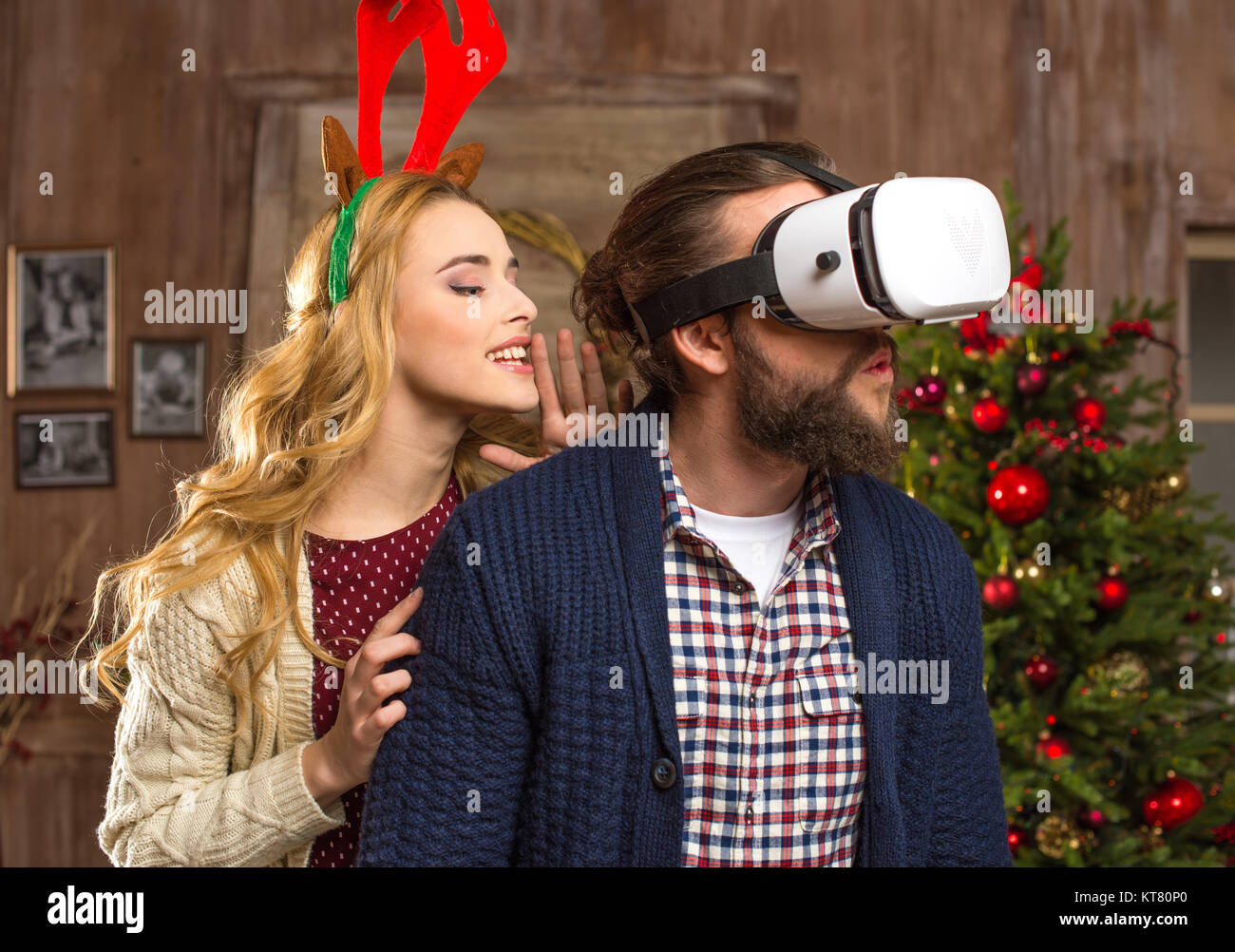 Couple using virtual reality headset Stock Photo - Alamy