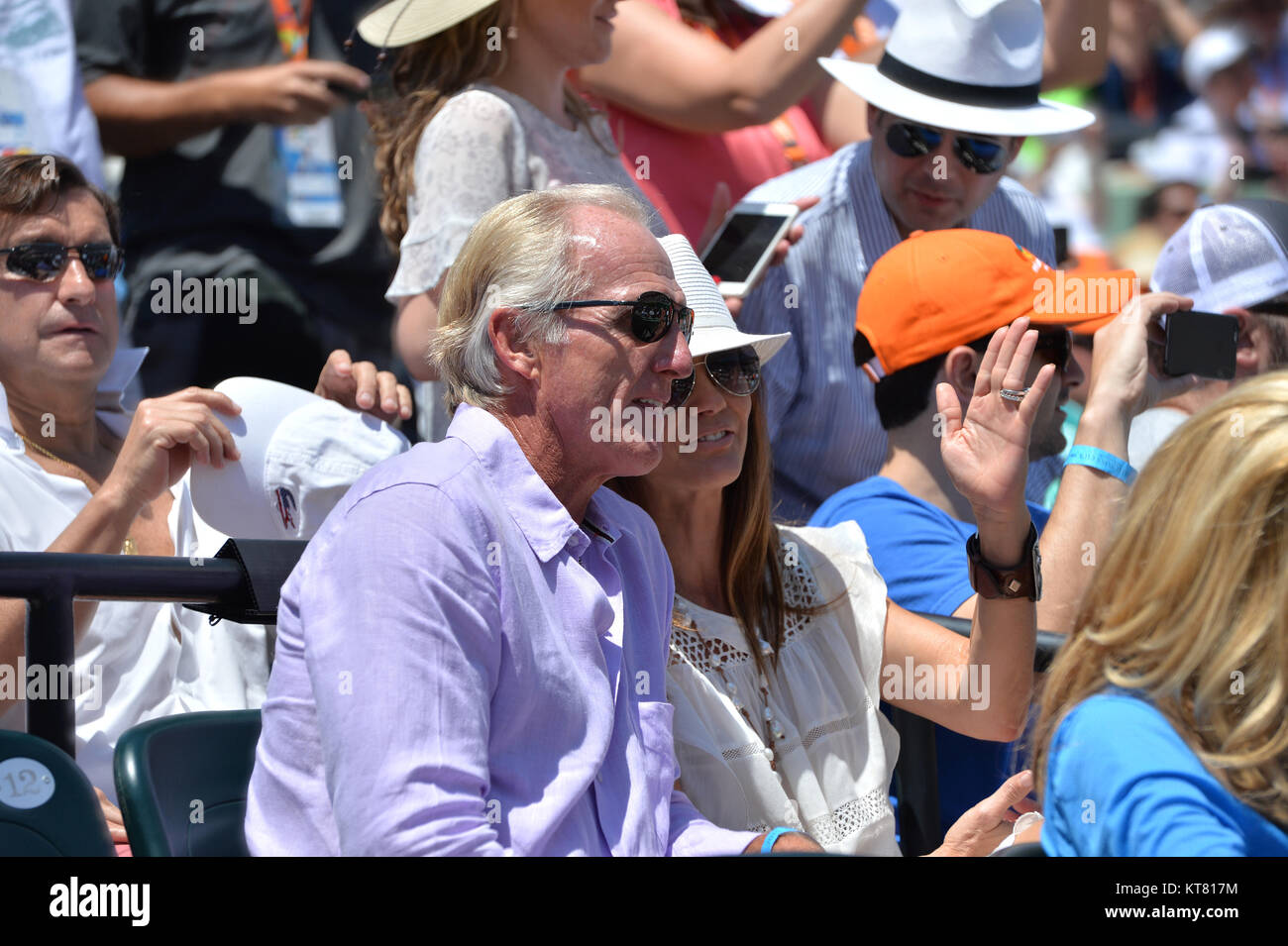 Key Biscayne Fl April 05 Golfer Greg Norman And Wife Kirsten Kutner Watch Novak Djokovic Of Serbia Defeat Andy Murray Of Great Britain In The Mens Final During The Miami Open