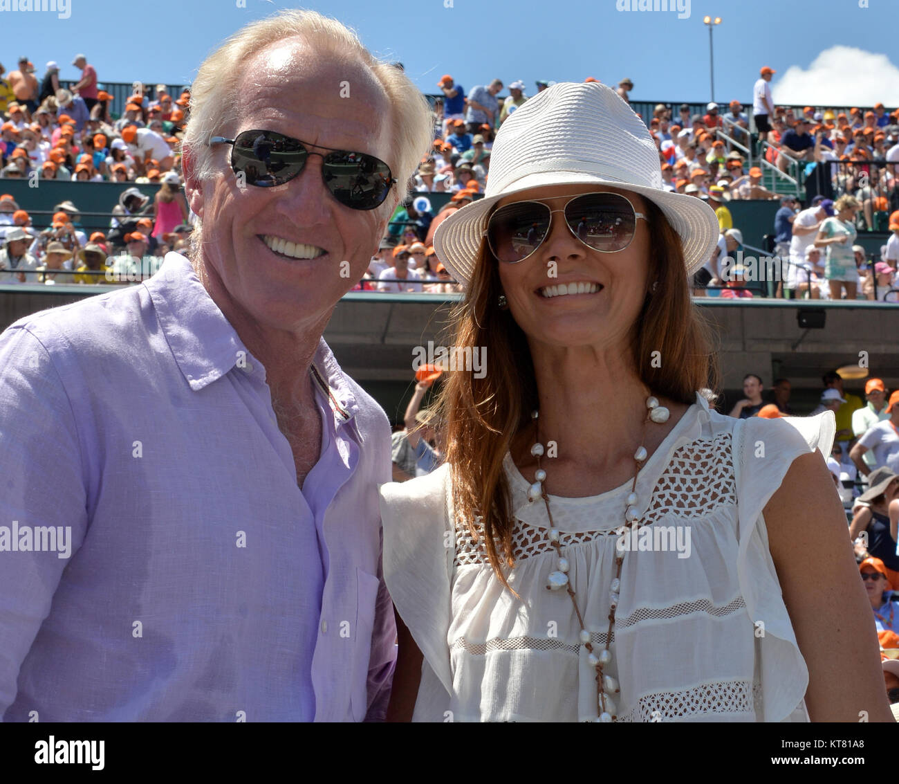 Key Biscayne Fl April 05 Golfer Greg Norman And Wife Kirsten Kutner Watch Novak Djokovic Of Serbia Defeat Andy Murray Of Great Britain In The Mens Final During The Miami Open