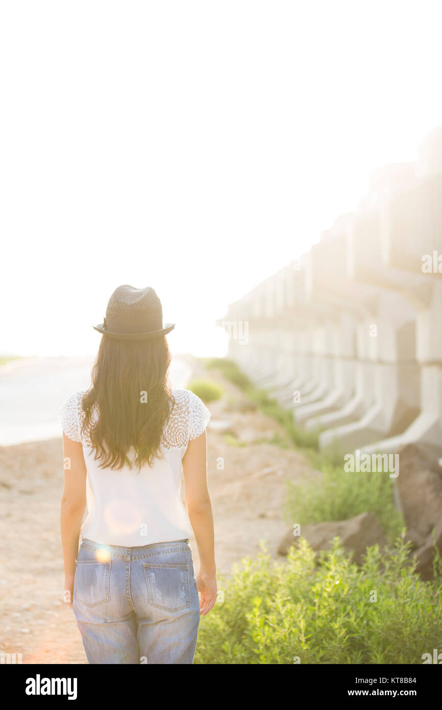 Woman with long hair and a hat hi-res stock photography and images - Alamy