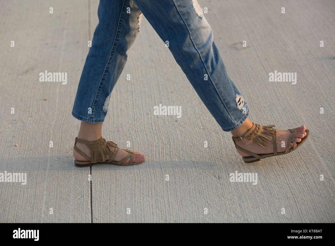 Close up of a woman walking outdoors Stock Photo