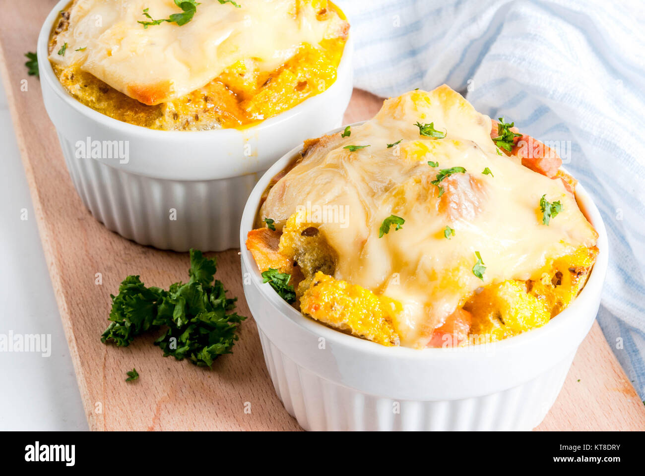 Homemade italian bread casserole strata with cheese, egg and ham, white
