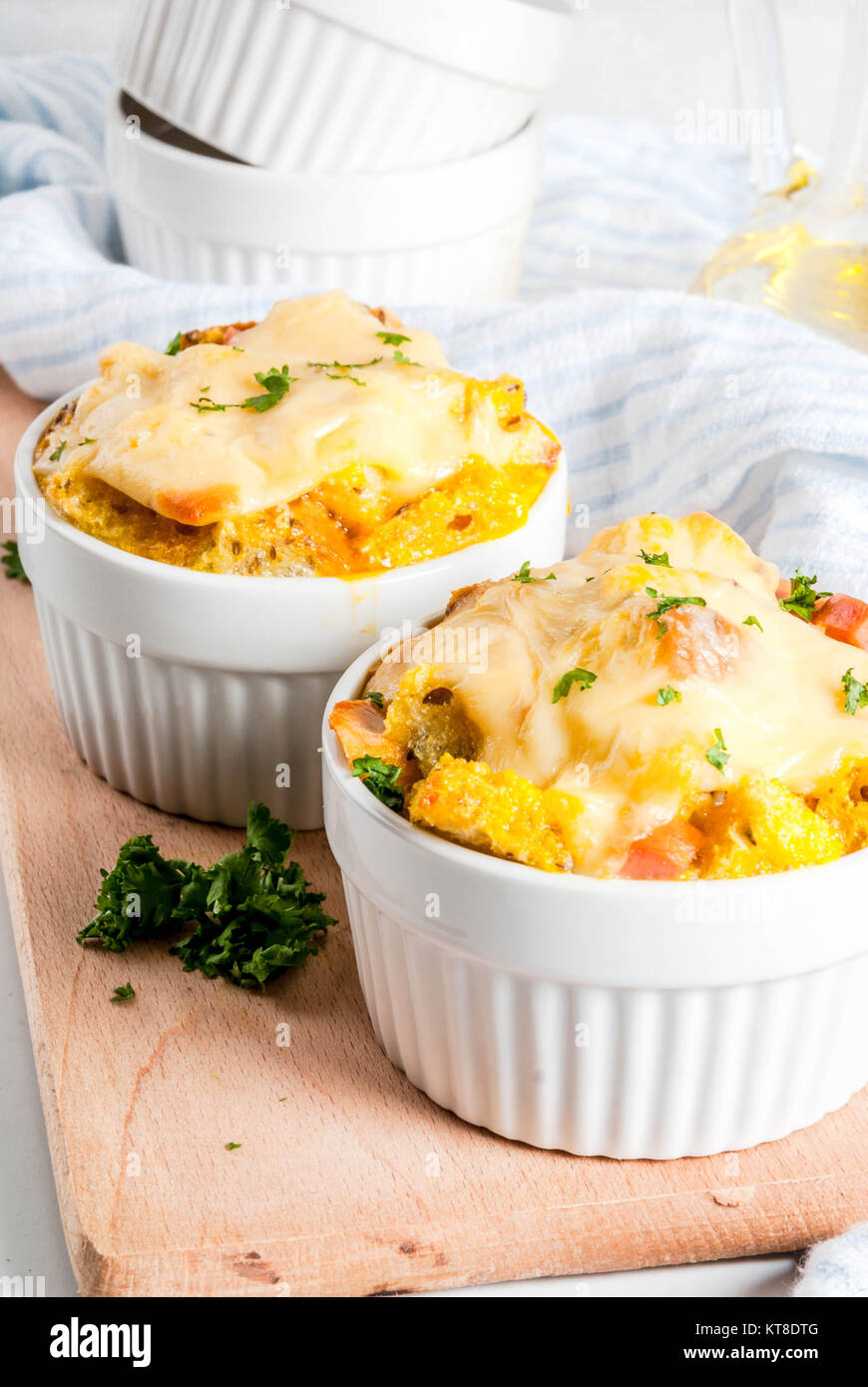 Homemade italian bread casserole strata with cheese, egg and ham, white