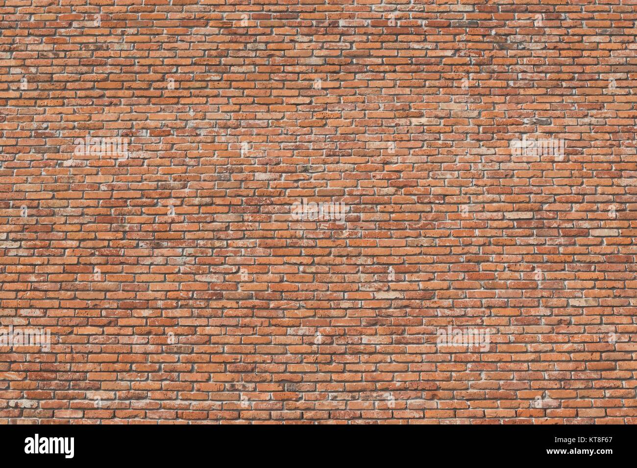 Red brick wall texture grunge background with matt film effect Stock Photo