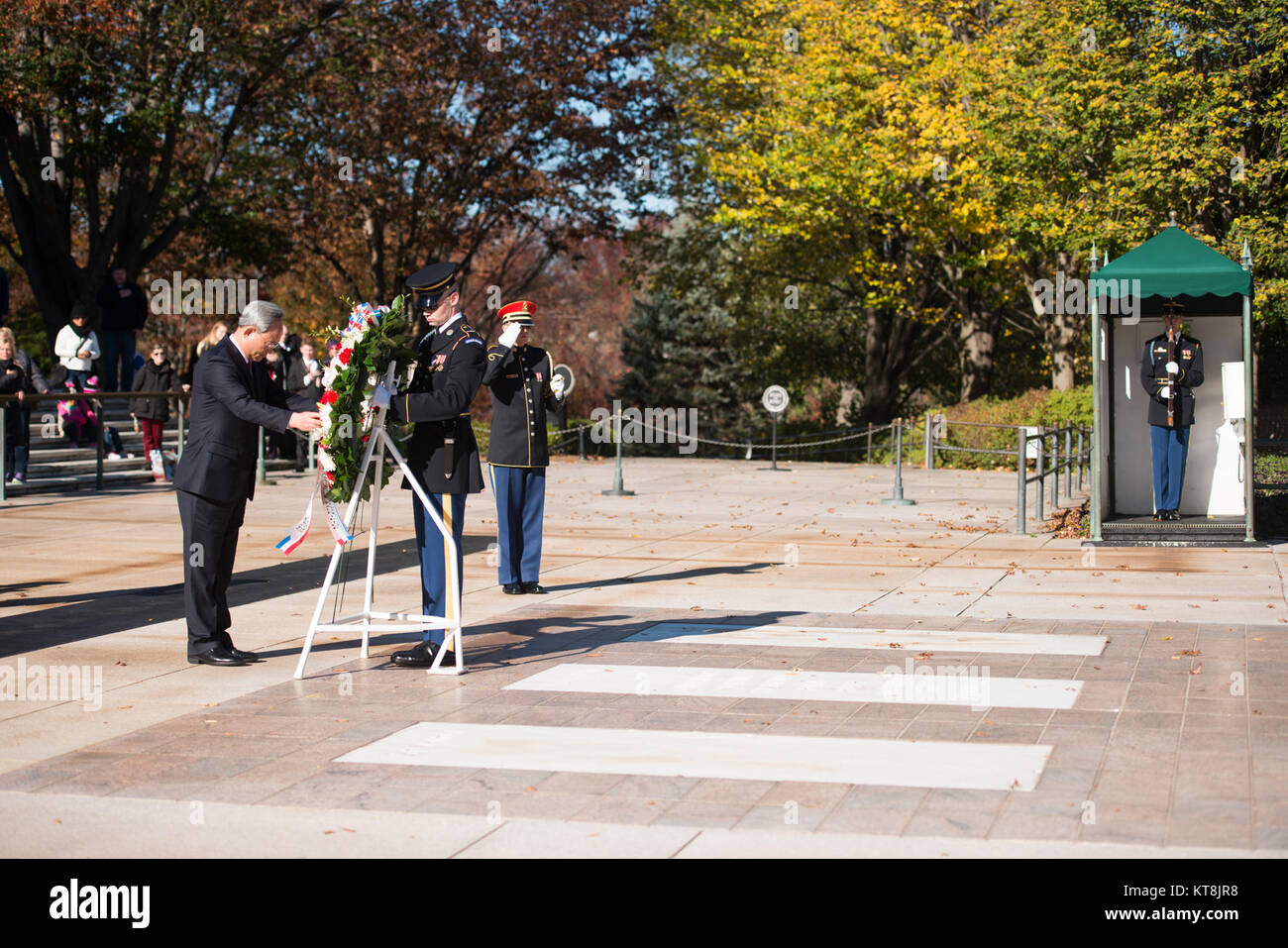 South Korean Deputy Minister of Personnel and Welfare Hwang Woo Woong lays a wreath at the Tomb of the Unknown Soldier at Arlington National Cemetery Nov. 20, 2015, in Arlington, Va. Dignitaries from all over the world pay respects to those buried at Arlington National Cemetery in more than 3000 ceremonies each year. (U.S. Army photo by Rachel Larue/Arlington National Cemetery/Released) Stock Photo