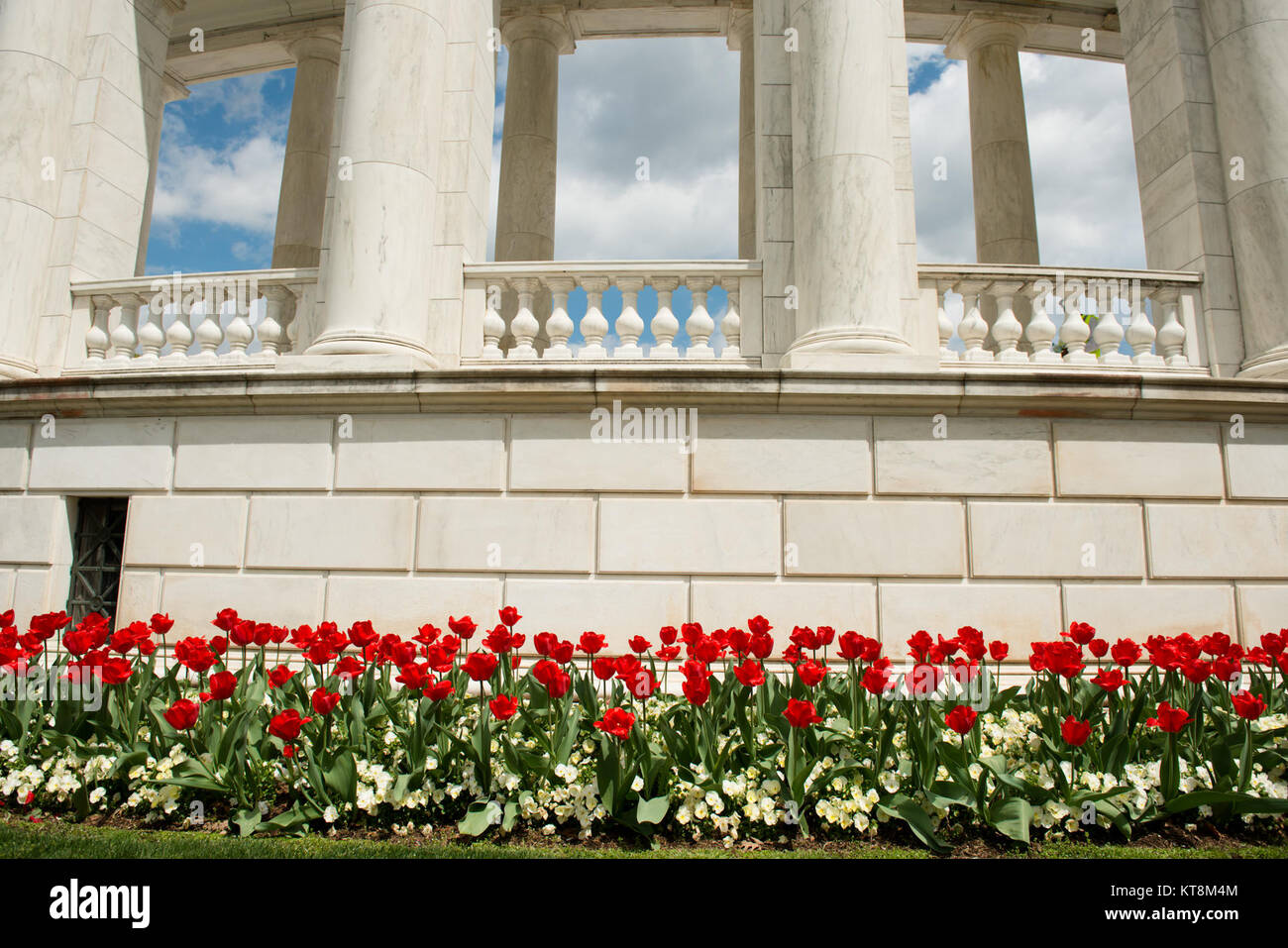 Flowers bloom next to the Memorial Amphitheater in Arlington National