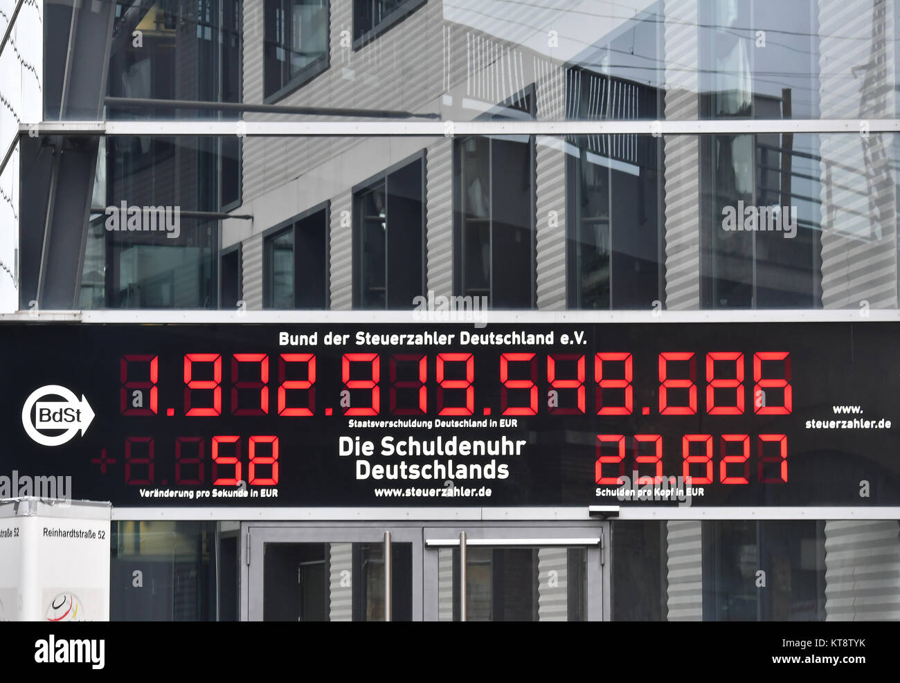 The public debt clock of the German Taxpayers' Association counts debt in Berlin, Germany, 22 December 2017. Media reports have stated that at the start of 2018, the clock will run backwards for the first time in its 22 years of existence. Photo: Paul Zinken/dpa Stock Photo