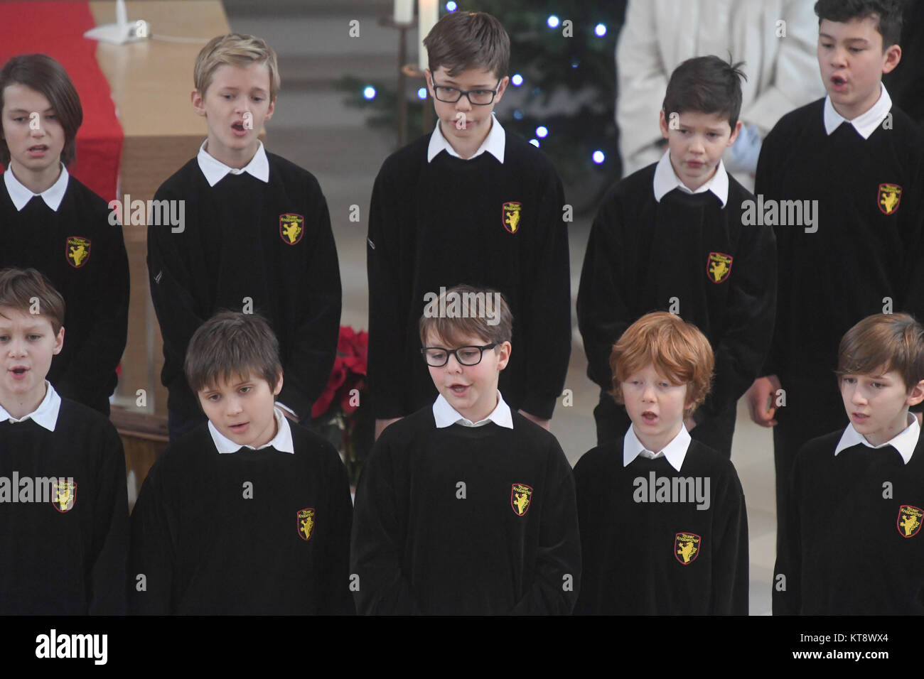 The Toelz boys' choir singing during the ecumenical Christmas carol service in the church room at the Stadelheim Prison in Munich, Germany, 22 December 2017. Photo: Felix Hörhager/dpa Stock Photo