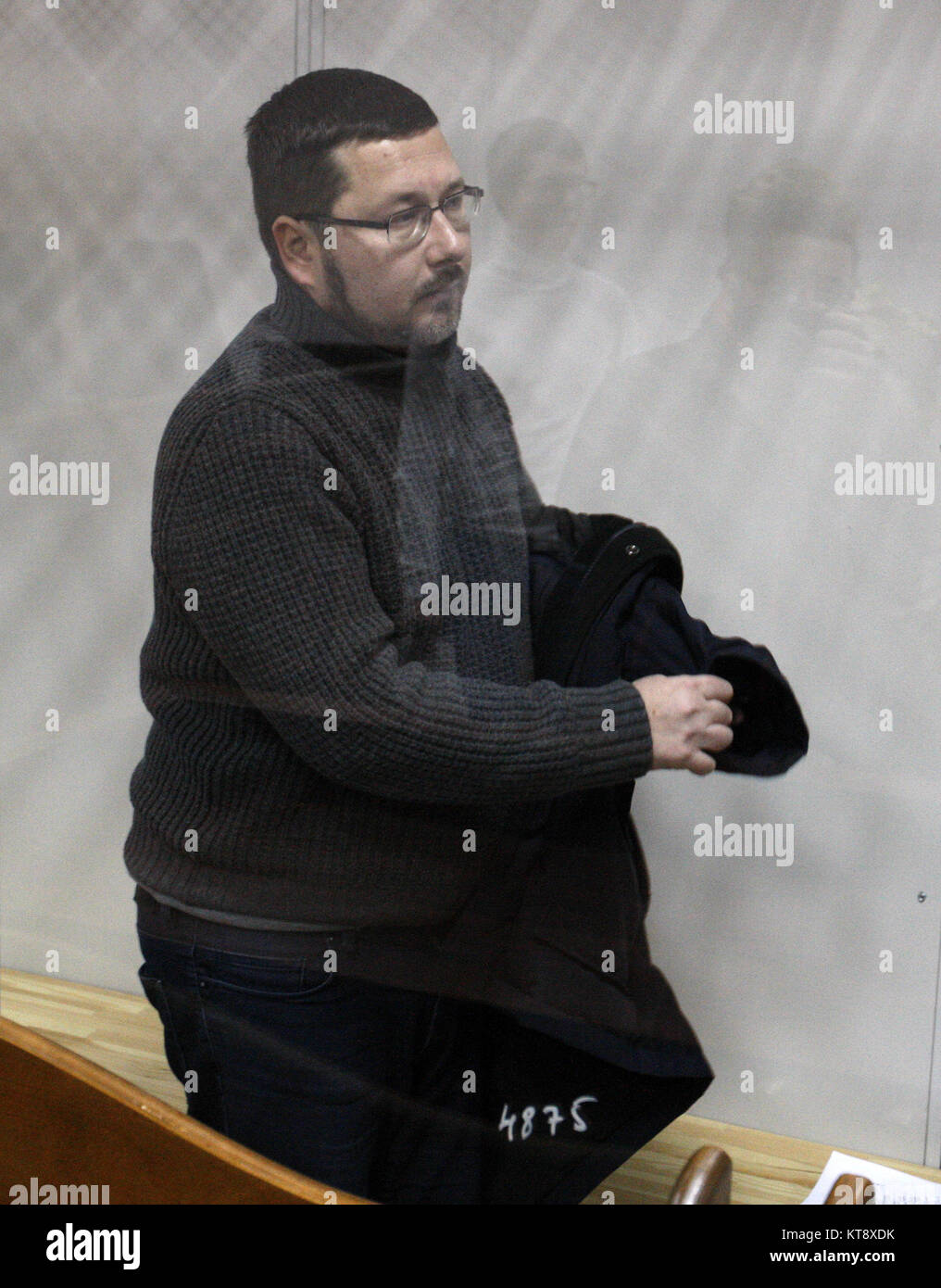 Kiev, Ukraine. 22nd Dec, 2017. STANISLAV YEZHOV stands inside a ...