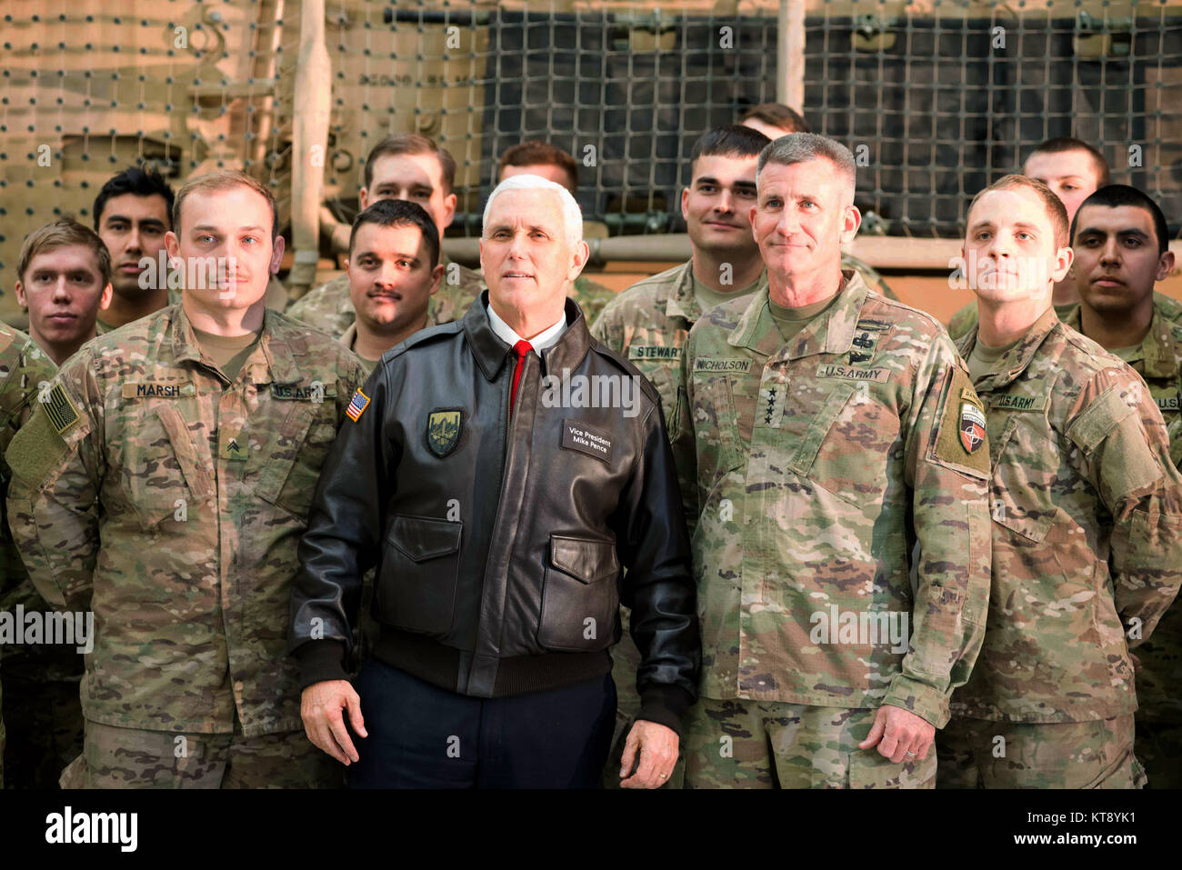 Bagram, Afghanistan. 21st Dec, 2017. U.S. Vice President Mike Pence poses with Gen. John Nicholson, commander of U.S. Forces in Afghanistan, right, during an unannounced Christmas visit to Bagram Air Base December 21, 2017 in Bagram, Afghanistan. Pence showed his support for the Afghan government and warned neighboring Pakistan to stop harboring militant groups. Credit: Planetpix/Alamy Live News Stock Photo