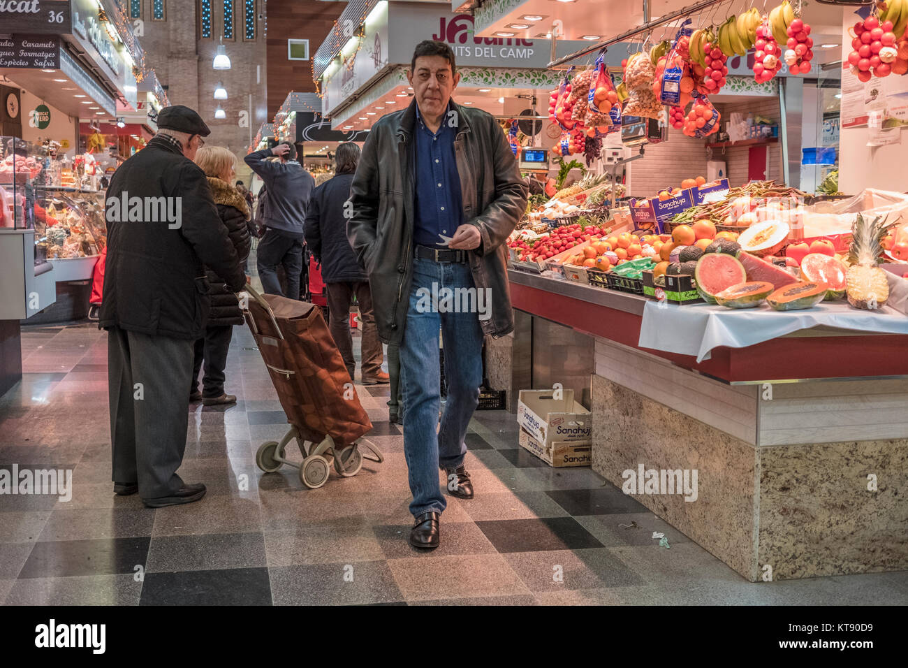 Barcelona citizens with their daily shopping after day of catalonia regional elections at Sants Market 22nd Dec. 2017. Stock Photo