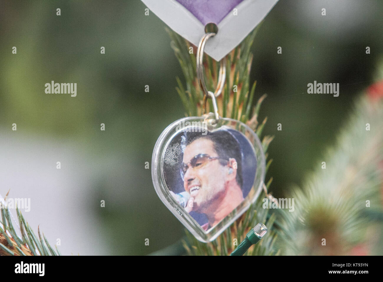 London, UK. 23rd Dec, 2017. The first anniversary  approaches of the death of British and International pop legend  George Michael  who died in Goring on Thames on 25 December 2016. Many devoted fans continue to visit and leave posthumous  tributes including  handmade items, flowers, posters and photographs at the George Michael memorial garden  set up outside the singer's former home in North London Credit: amer ghazzal/Alamy Live News Stock Photo