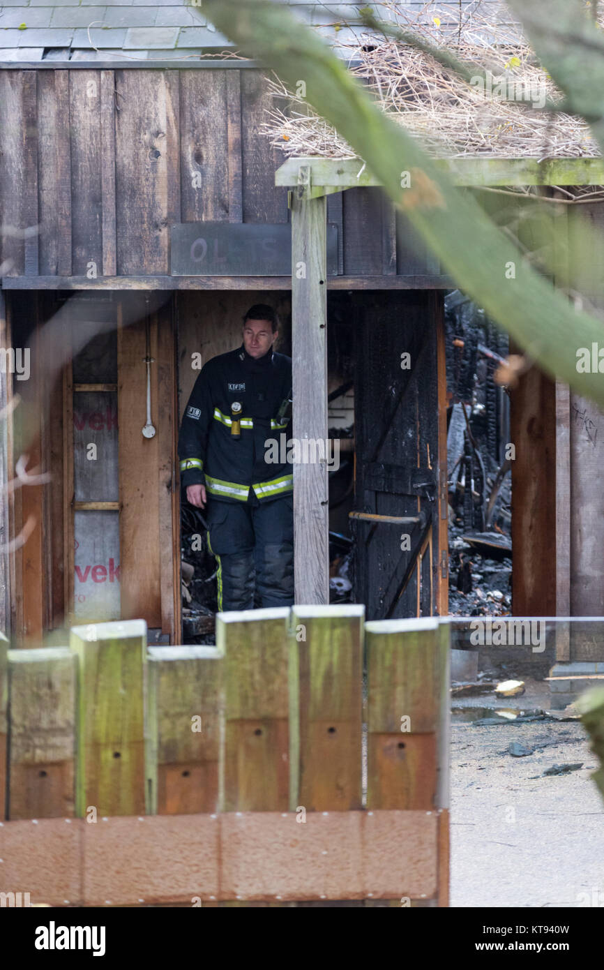 ZSL London Zoo, London, UK. 23rd Dec, 2017. Firemen, investigators, zoo staff and keepers assess the damage and search for the four meerkats still missing at this point, after Misha the aardvark was sadly found to have died as a consequence of the fire. A fire broke out affecting the Animal Adventure shop and cafe area, and parts of the enclosures of the much loved London institution in Regents Park. The fire was brought under control, the Zoo remains closed to the public. Credit: Imageplotter News and Sports/Alamy Live News Stock Photo