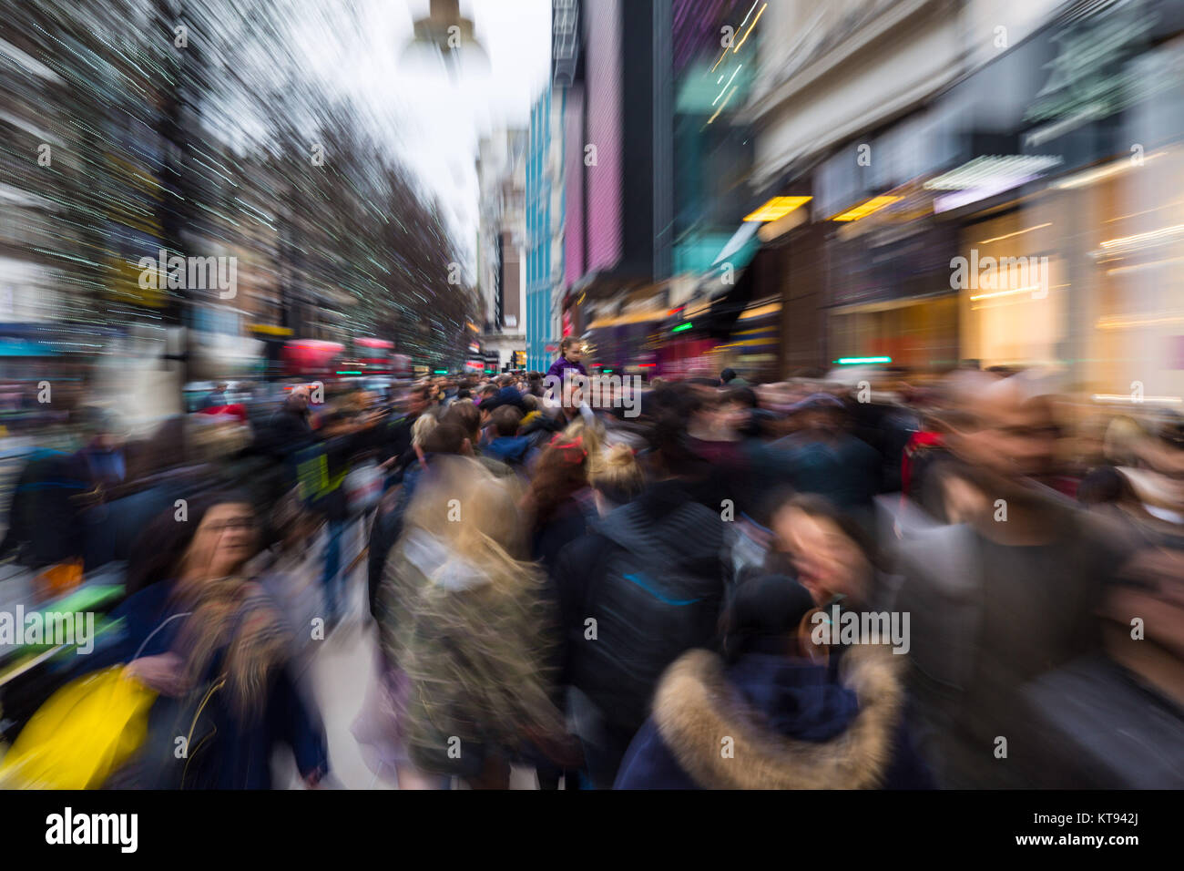 London, UK. 23rd Dec, 2017. Shoppers crowd London's Oxford Street on the second last shopping days before Christmas, with many shops now offering up to 70% off as they push to make their sales projections. Credit: Paul Davey/Alamy Live News Stock Photo