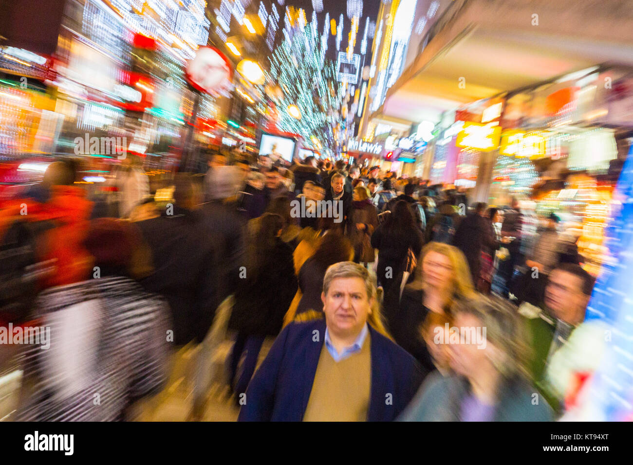 London, UK. 23rd Dec, 2017. Shoppers crowd London's Oxford Street on the second last shopping days before Christmas, with many shops now offering up to 70% off as they push to make their sales projections. Credit: Paul Davey/Alamy Live News Stock Photo