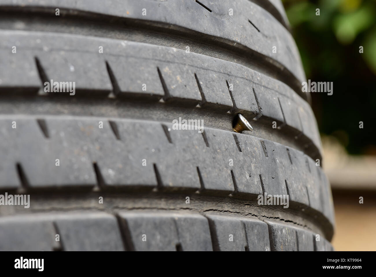 a screw in the tire Stock Photo