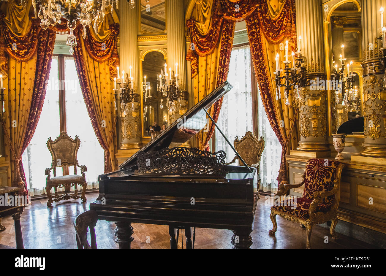 Grand Piano in Fancy Parlor with Floor to Ceiling Windows Stock Photo -  Alamy