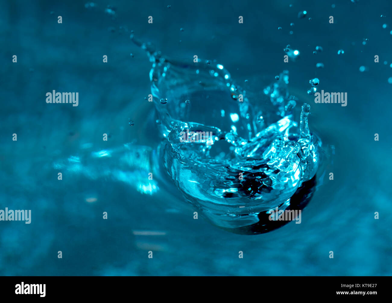 Ball dropping to water closeup Stock Photo Alamy
