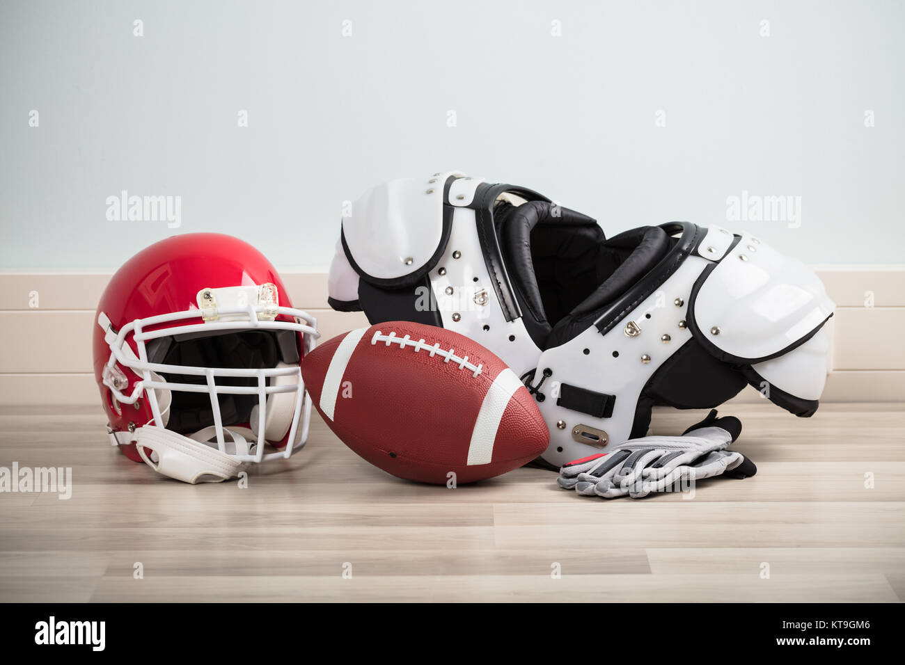 Sport Equipments On Hardwood Floor Stock Photo - Alamy