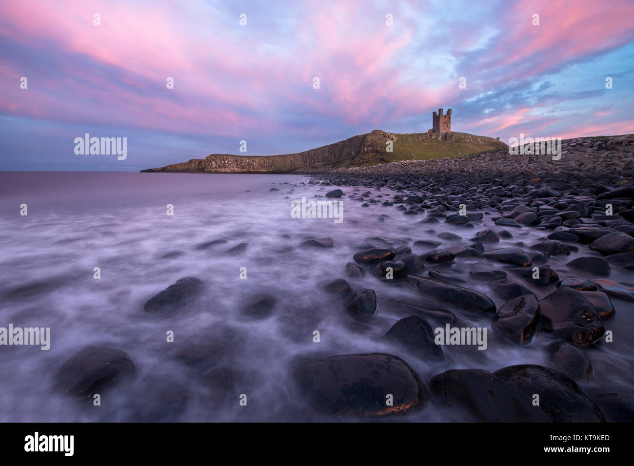 Dunstanburgh Castle in Northumberland. Stock Photo