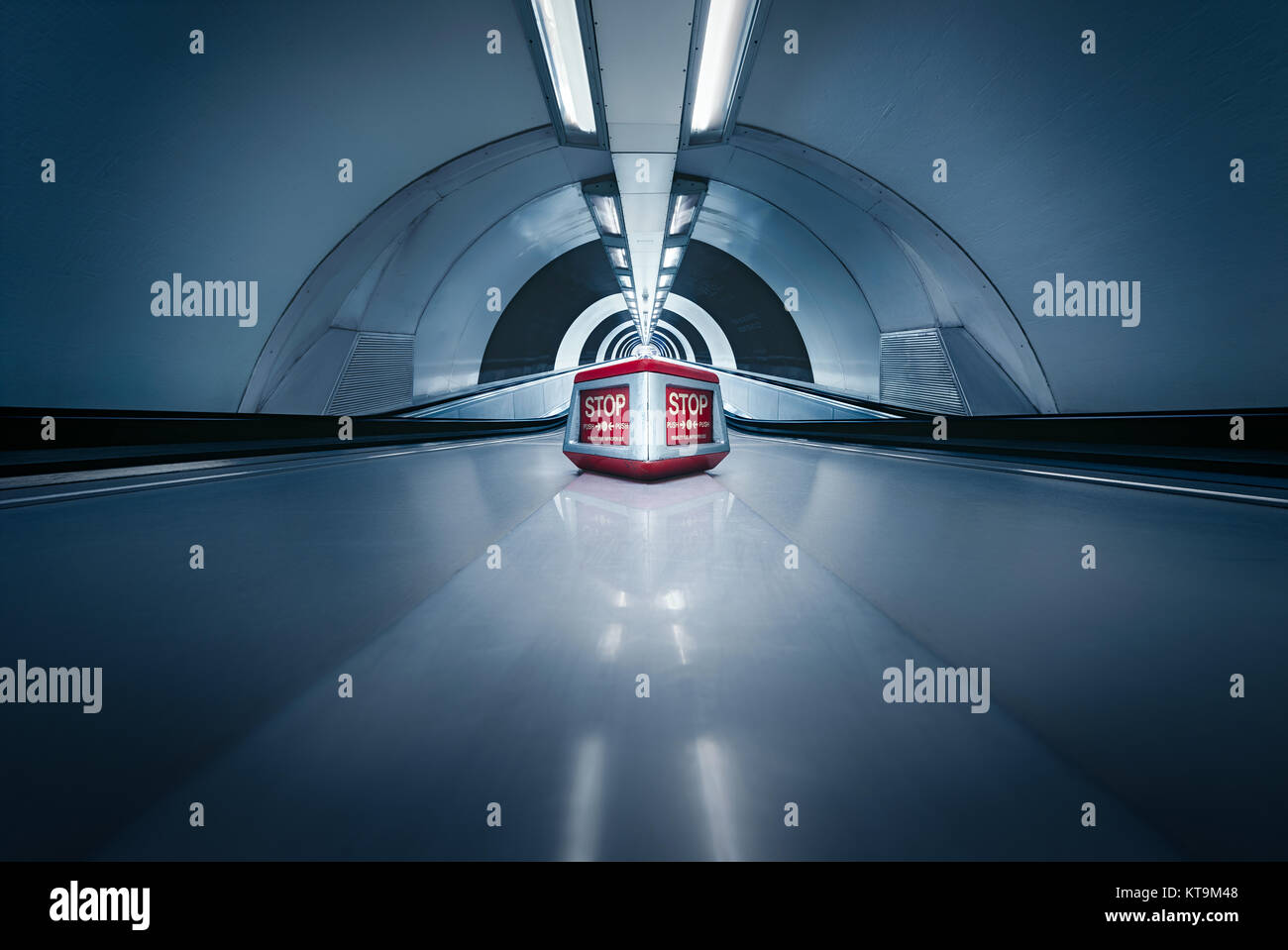 Moving walkway inside Bank Underground Station, London, connecting passengers from street level to the Waterloo & City Line. Stock Photo