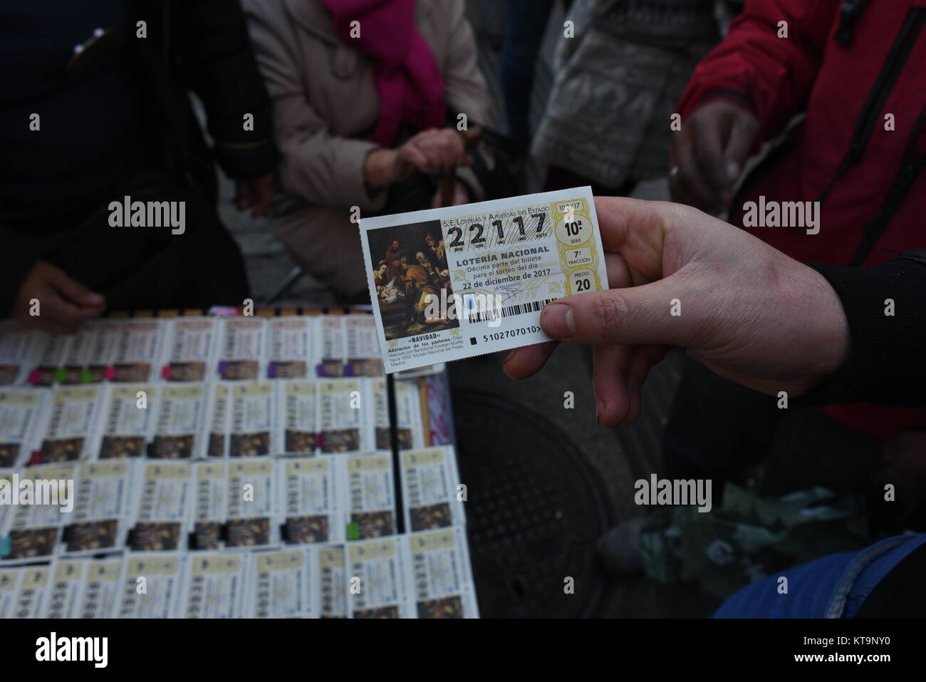 A man shows his ticket of 'El Gordo' Christmas lottery in Madrid. (Photo by Jorge Sanz / Pacific Press) Stock Photo