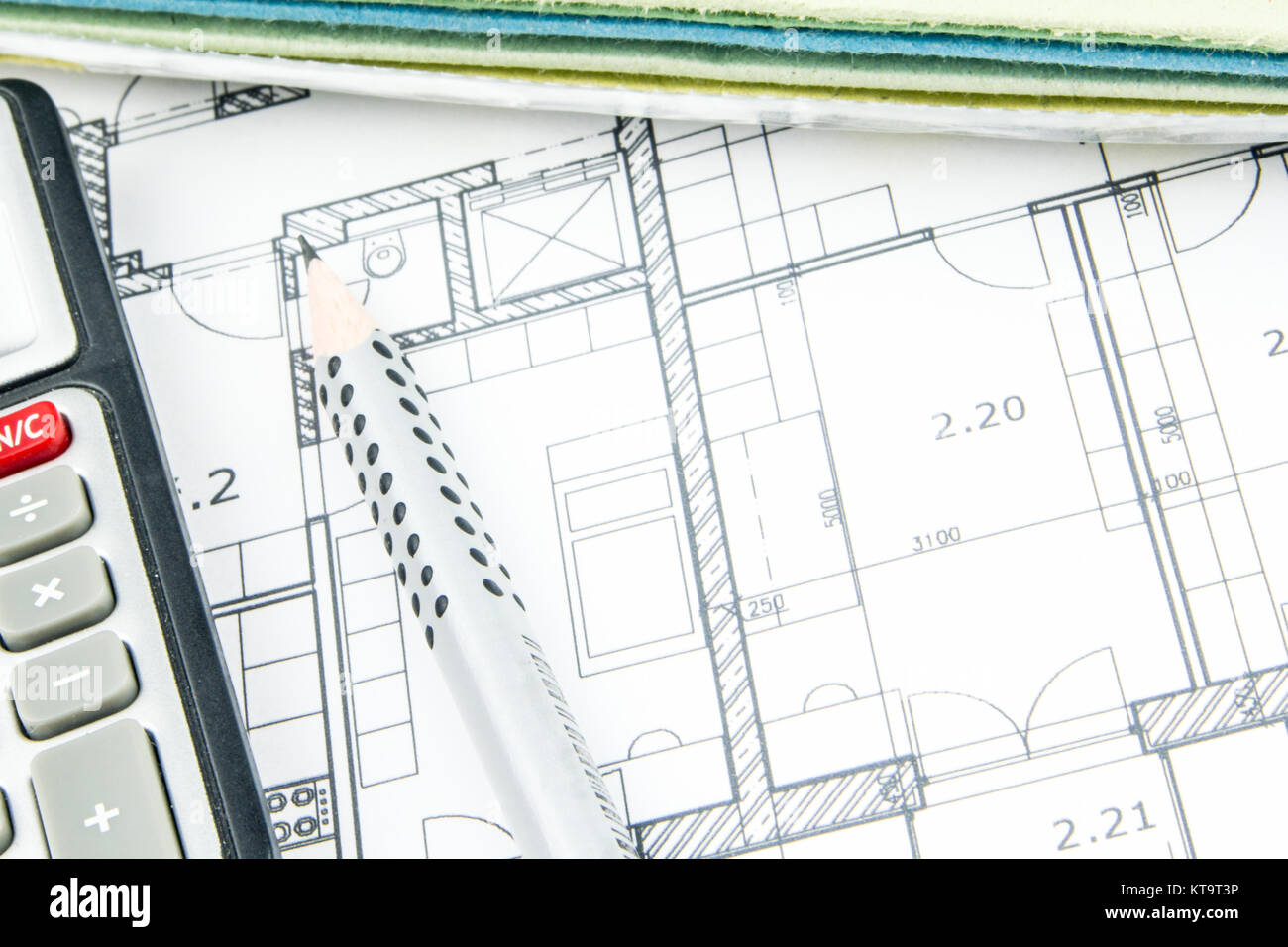 construction plan closeup with calculator , pencil and hard desks Stock Photo