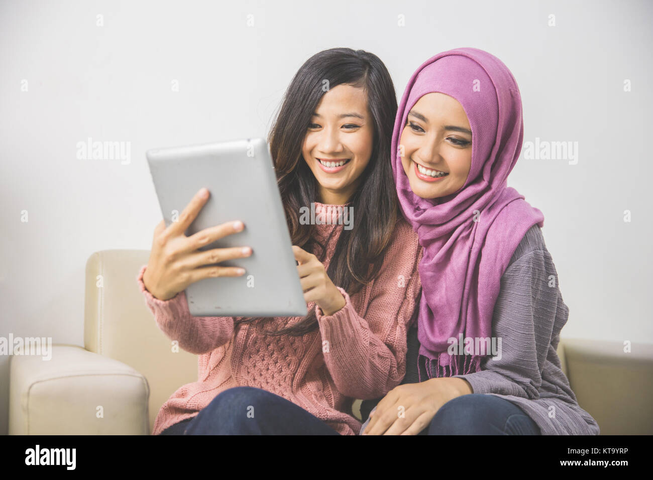 Two happy pretty asian hi-res stock photography and images - Alamy