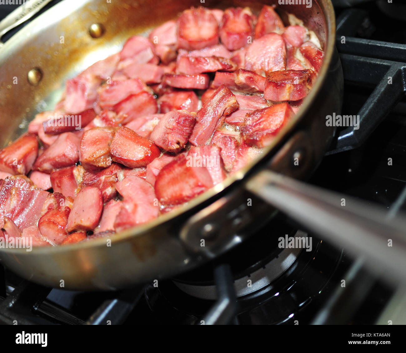Pork in a saute pan Stock Photo