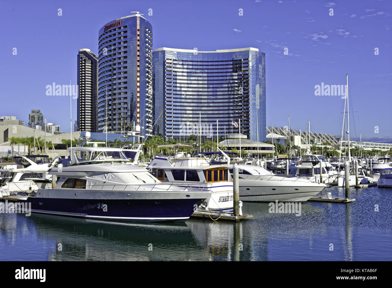 SAN DIEGO, CLAIFORNIA USA - NOVEMBER 5, 2017: Luxury yachts in Embarcadero Marina near Seaport Village in San Diego Bay with the San Diego skyline and Stock Photo