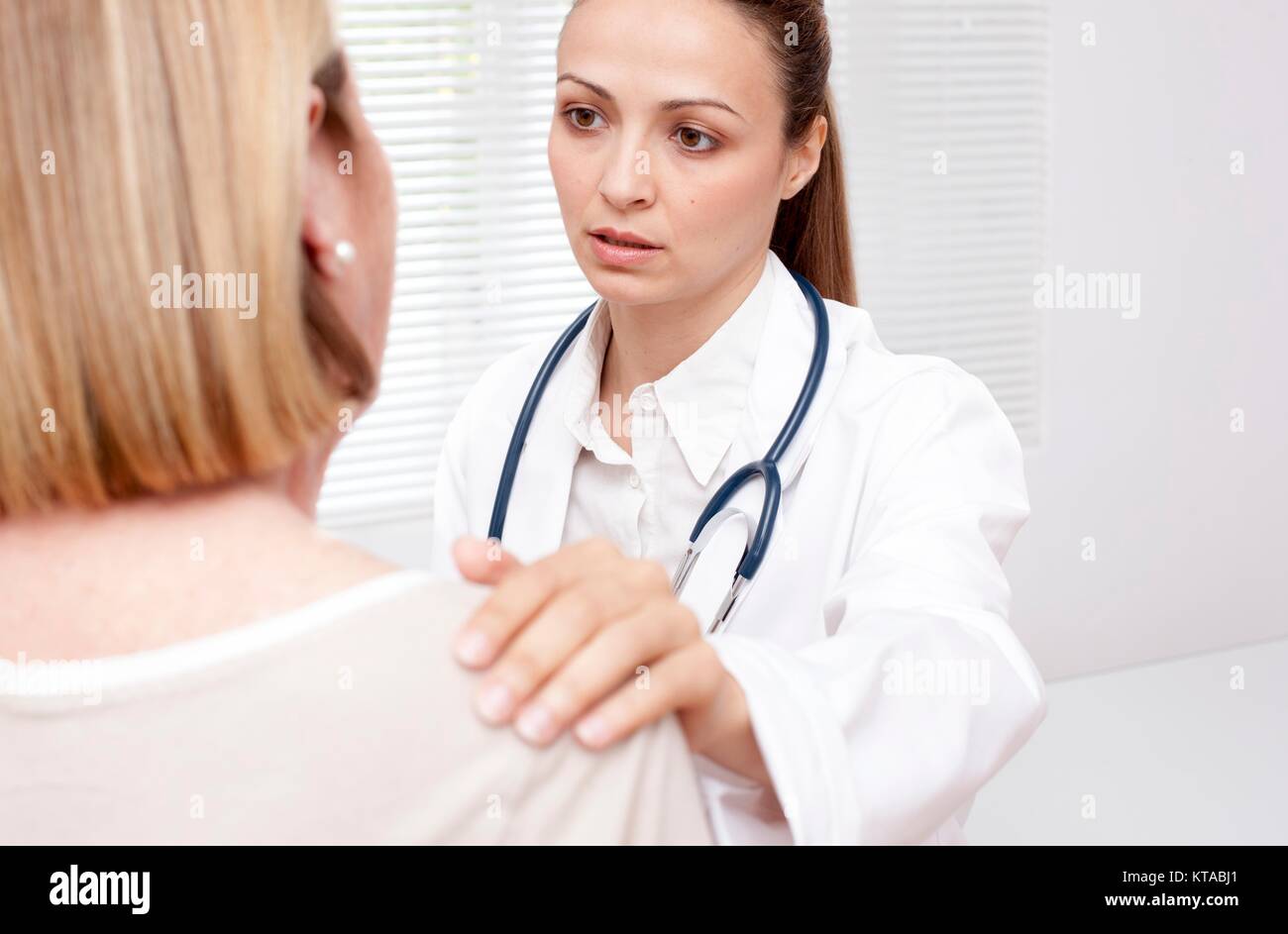 Female doctor with senior female patient. Stock Photo