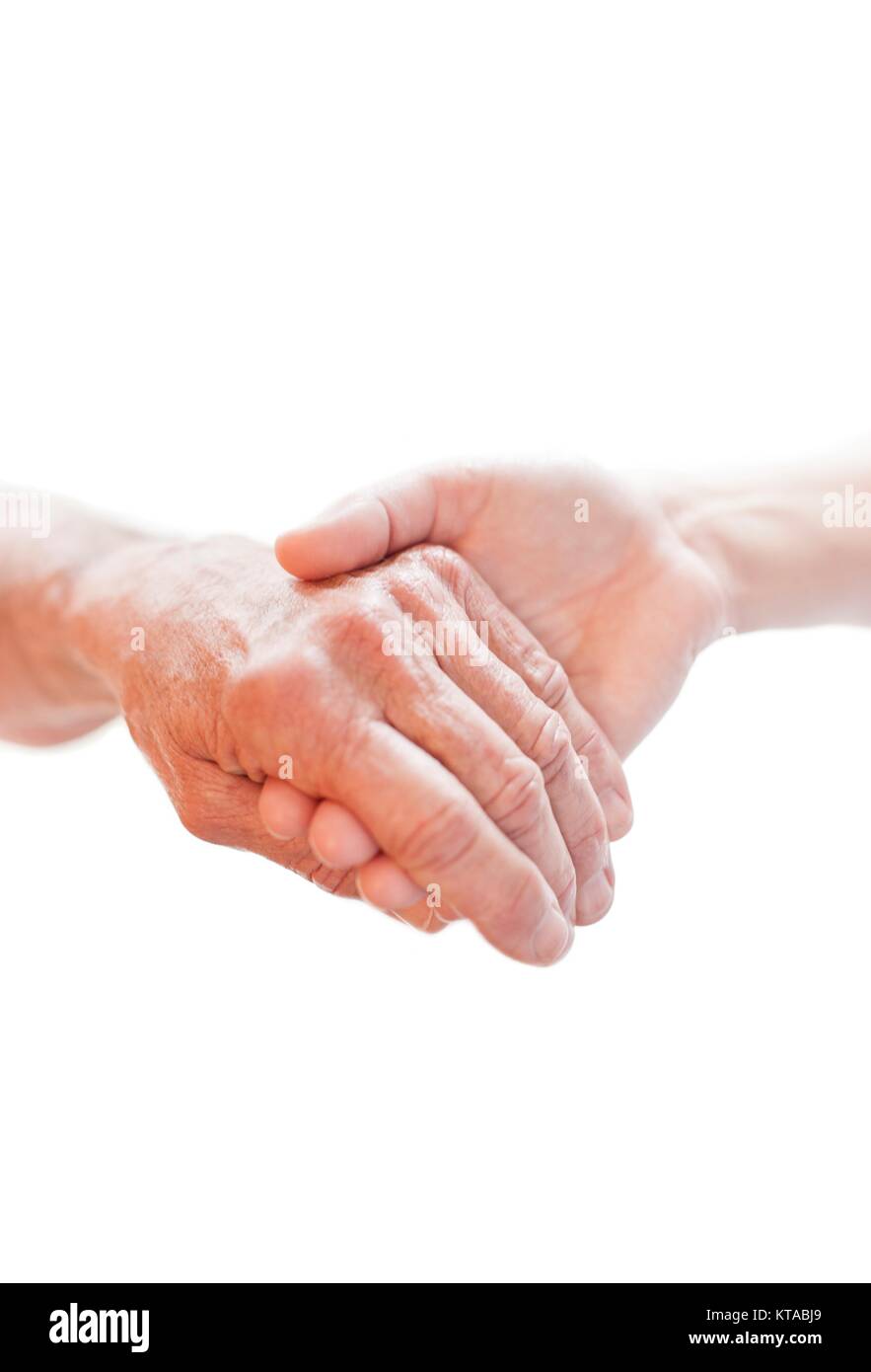 Person holding another's hand, close up. Stock Photo