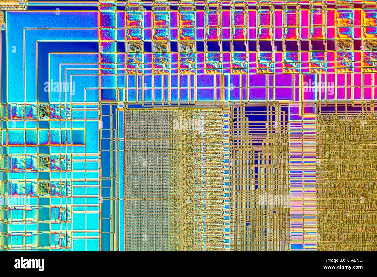 Light micrograph of a detail of a RAM computer memory chip. RAM is a type of computer memory that can be accessed randomly; that is, any byte of memory can be accessed without touching the preceding bytes.This is the most common type of memory found in personal computers and different other electronic devices like cellular phones, usb sticks and printers. Objcet size of this section approx. 1.2 mm across. Stock Photo