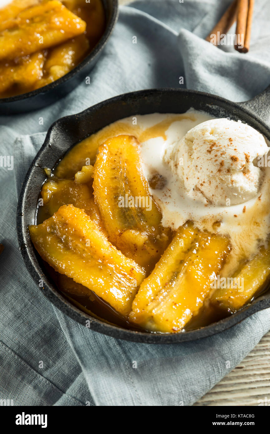 Homemade Sauteed Bananas Foster with Cinnamon and Ice Cream Stock Photo