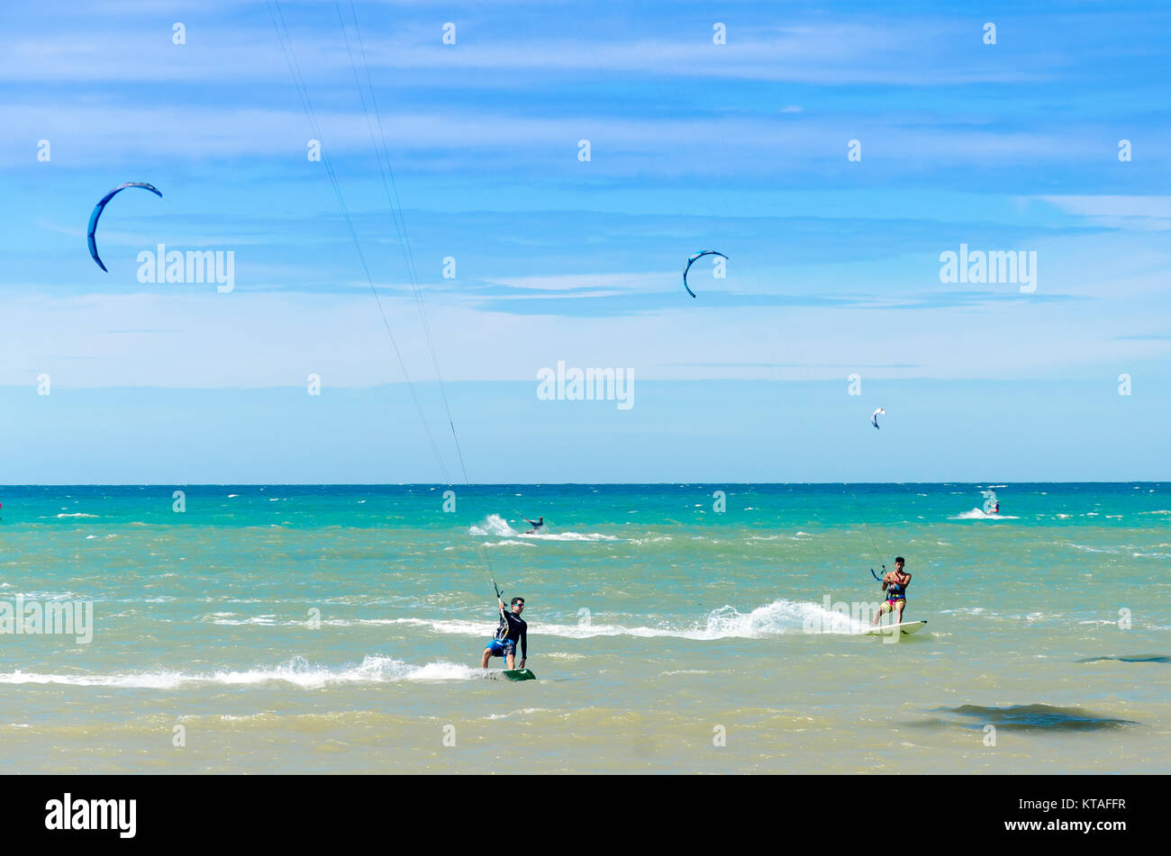 Cumbuco, Brazil, jul 9, 2017: Beach in Cumbuco at the Ceara state with multiple kite surfing sport people Stock Photo