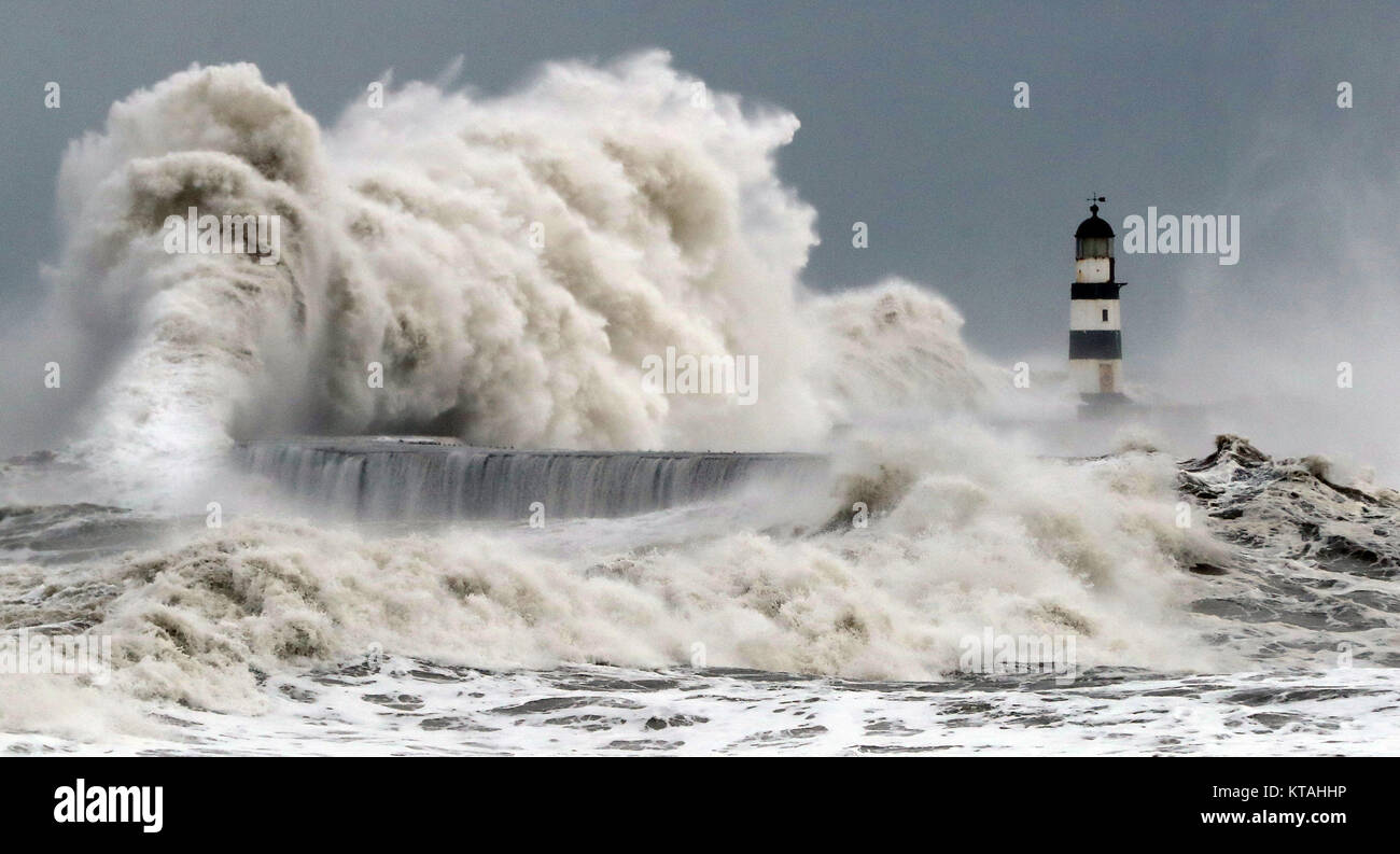 Review of the Year 2017: January: Waves crash into the sea wall at Seaham Harbour as Scotland and the North of England were covered in a blanket of snow while the east coast was braced for a storm surge. Stock Photo