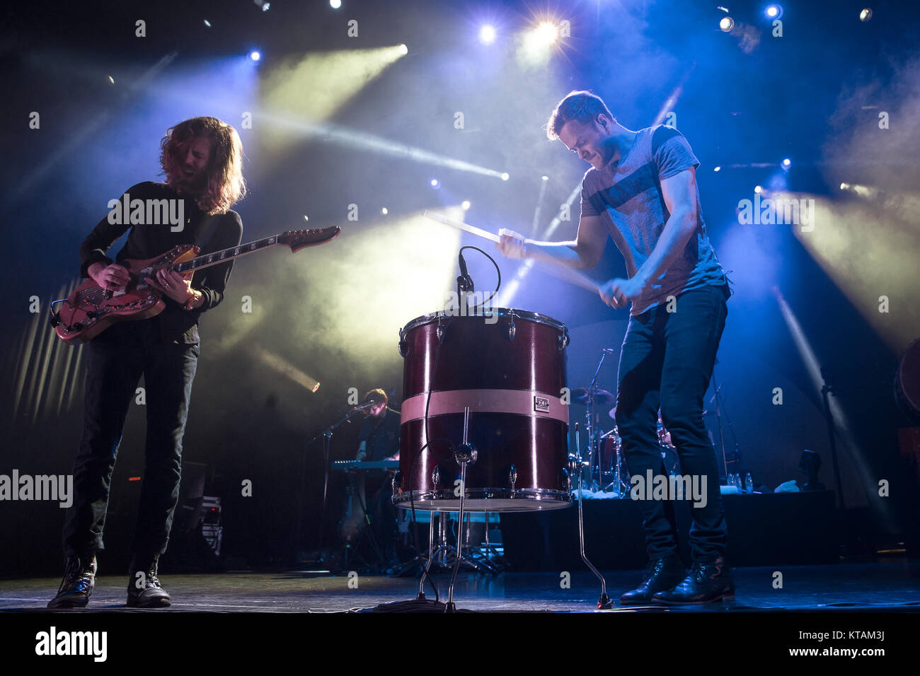 The American rock band Imagine Dragons performs a live concert at Falconer Salen in Copenhagen. Here lead singer Dan Reynolds is seen live on stage with guitarist Wayne Sermon. Denmark, 04/11 2014. Stock Photo
