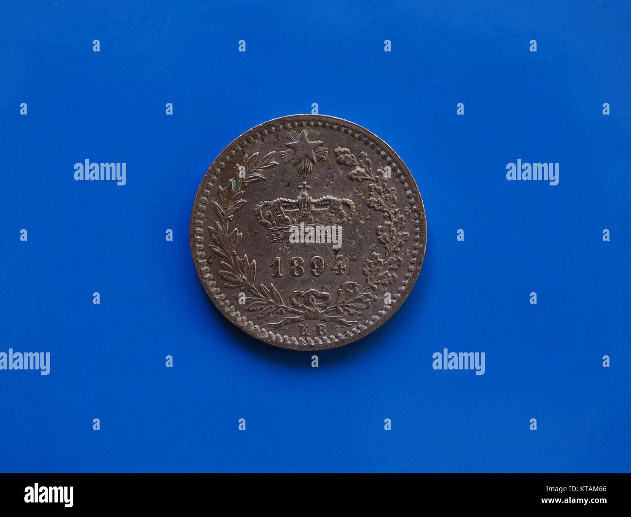 20 cents coin, Kingdom of Italy over blue Stock Photo