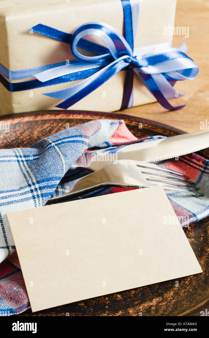 Dining Table Setting with Empty Tag and Present Stock Photo Alamy