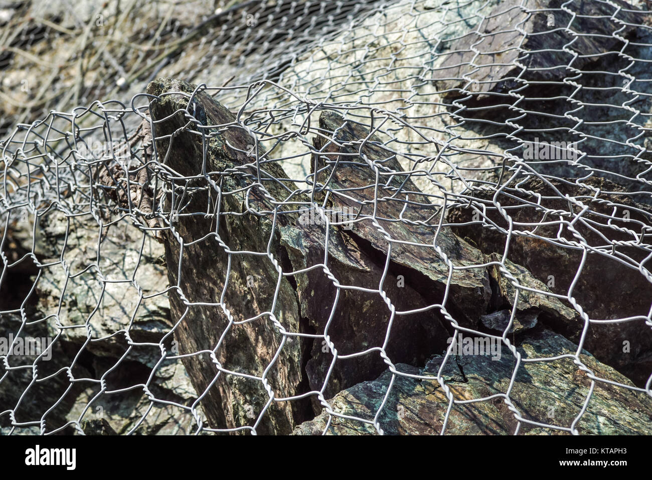network to boulders Stock Photo - Alamy