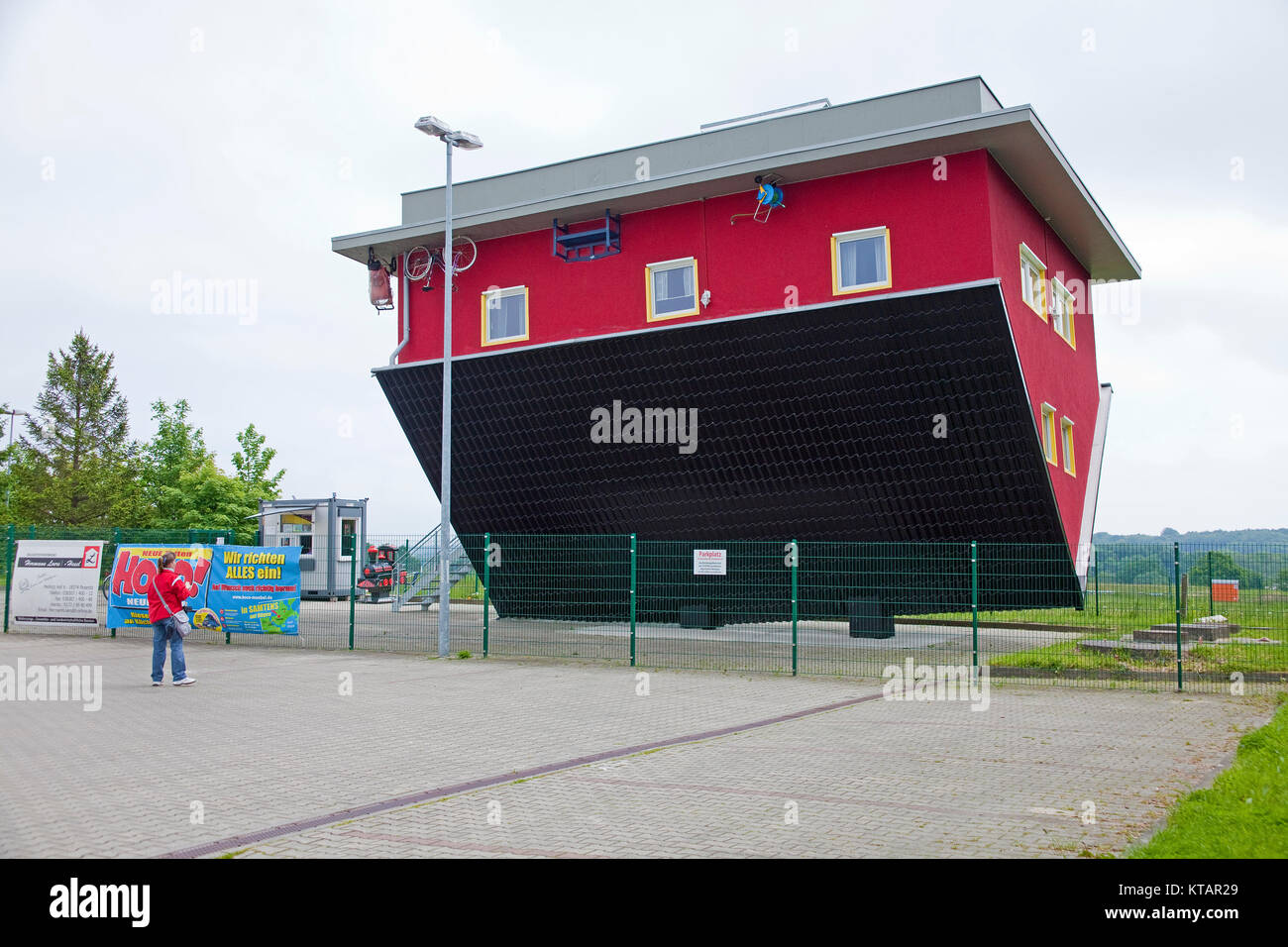 House upside down, Putbus, Ruegen island, Mecklenburg-Western Pomerania, Baltic Sea, Germany, Europe Stock Photo