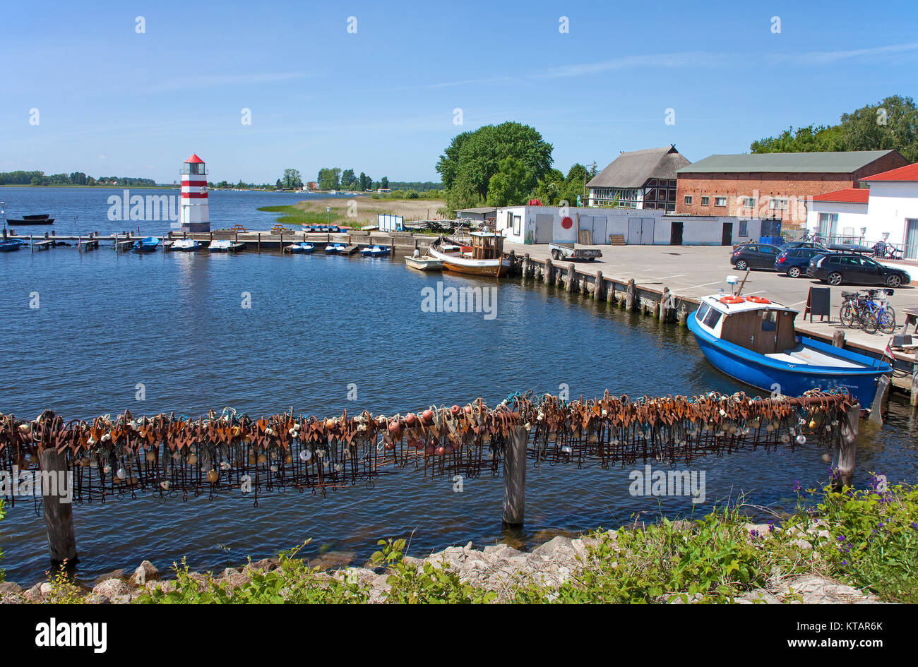 Rusty anchors at harbour of fishing village Waase, Ummanz island, National park Vorpommersche Boddenlandschaft, Ruegen island, Baltic sea, Germany Stock Photo